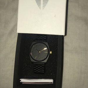 Matte black/ gold Nixon watch